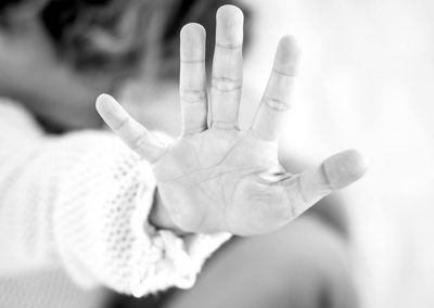 An outreached palm of hand with fingers spread